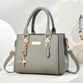 Dark grey pebble leather handbag with gold star charm and adjustable strap - Star Style/Light Gray