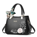 Black leather tote bag featuring pink rose embroidery and decorative floral silk scarf - Black/Rose