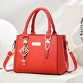Red lychee pattern leather handbag with gold metal hardware and luxury hanging pendant - Diamond Style/Bright Red