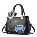 Elegant black embroidered handbag with blue flowers, silk scarf, and metallic logo - Black/Peony