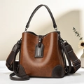 Vintage brown leather bucket bag with contrasting straps and wide woven shoulder strap - L23 W12 H22 / Khaki/Earth Yellow