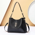 Glossy black crocodile pattern bucket bag with gold chain strap and metal buckle - Black