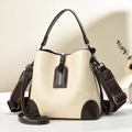 Chic cream crossbody bucket bag with brown handles and dual detachable shoulder straps - L23 W12 H22 / Off-white