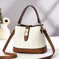 Contrast leather bucket bag in cream and brown with litchi texture and gold lock - L22xW10xH17 / Off-white