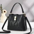 Black pebbled leather bucket bag with unique lattice texture and gold metal buckle - L22xW10xH17 / Black