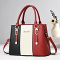 Borsa a mano tricolore in pelle a strisce nero bianco e bordeaux con logo dorato - Borgogna