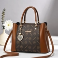 Elegant brown patchwork tote bag with monogram canvas and gold heart pendant accessory - Coffee & Mustard Yellow