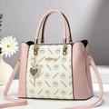 Pink and beige crossbody handbag for women with litchi grain texture and heart charm - White and Pink