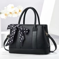 2025 stylish black lychee leather bucket bag with polka dot scarf and golden hardware - Black