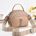 Chic beige quilted crossbody bag with ethnic patterned strap and dual compartments - Khaki