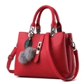 Red lychee pattern leather handbag with diamond stitching and fur pompom accessory - 29x13x21cm / Burgundy