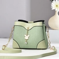 Elegant light green pleated handbag with golden chain strap and cute rabbit charm pendant - Green