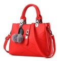 Bright red lychee texture leather handbag with silver twist lock and gray fur ball charm - 29x13x21cm / Red