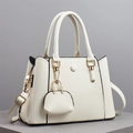 White lychee pattern shoulder bag with mini coin purse and gold hardware on stone base - White
