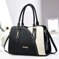 Chic black and white color-block leather handbag with gold accents and shoulder strap - 32x23x14cm / Black