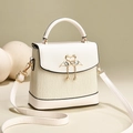 Creamy white pleated crossbody bag with gold swan buckle and pearly pendant charm - Off-white