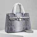 Elegant grey python-textured leather handbag with golden padlock and detachable strap - Gray