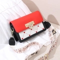 Contrast color crossbody bag with heart embroidery and a decorative golden metal heart buckle - Red/Black