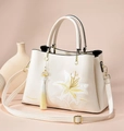 Elegant beige tote bag with lily embroidery, adjustable strap and tassel charm detail - Tassel Cream White (No Scarf)