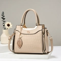 Elegant beige crocodile pattern handbag for women with metallic leaf charm and top handle - Khaki