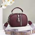 Burgundy litchi leather handbag with metal handle, wide strap and bear charm - Purple