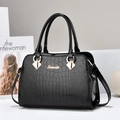 Elegant black crocodile texture handbag with gold hardware and top handles for women - Black