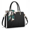 Elegant black and white contrast handbag with wave texture and decorative silk scarf - Black