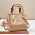 Glossy caramel quilted patent leather handbag with metal charms and top handles - Khaki
