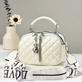 Quilted cream crossbody bag with chain handle and LOVE lettered woven shoulder strap - Off-white