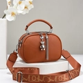 Brown litchi grain leather crossbody camera bag with patterned wide strap and bear charm - Khaki/Earth Yellow