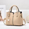 Elegant beige Mother's Day handbag with vertical stripes and rabbit pendant - Khaki