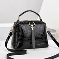 Glossy black crocodile pattern crossbody pillow bag with elegant gold hardware - Black