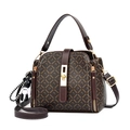 Women's dark brown monogram bucket bag with leather handles and bear pendant charm - Hook Style