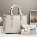 Detailed view of 3-piece cream lychee leather tote bag set with gold hardware and wallet - Handbag, Clutch And Card Holder / Off-white