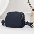 Navy blue nylon crossbody bag with gold zippers and adjustable shoulder strap for women - Blue/Solid