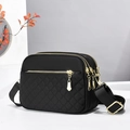 Elegante borsa a tracolla in nylon nero con tasche trapuntate e cerniere dorate - Nero Trapuntato