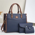 Three-piece women's handbag set in navy blue with brown trim and adjustable shoulder strap - Contrast Color Blue