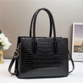 Glossy black crocodile pattern tote bag with top handles and adjustable shoulder strap - Black