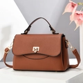 Brown litchi grain leather crossbody bag with gold U-shaped metal lock on a display stand - 25x11x16cm / Khaki/Earth Yellow