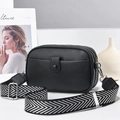 Black pebbled leather crossbody bag with three zip layers and wide geometric strap - Black / 21cm x 8cm x 14cm