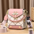 Pink and beige crossbody bag with quilted pattern, swan buckle and pearl detail - Pink