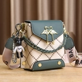 Green and cream crossbody phone bag with diamond stitching and flamingo metal detail - Green