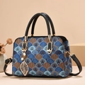Elegant women's handbag with vintage jacquard pattern, pearl charm and leather handles - Colorful Floral / Black