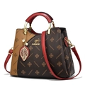 Three-tone colorblock handbag with floral monogram pattern and adjustable red strap - Coffee & Red
