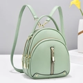 Mint green mini backpack in pebble leather with gold zippers and adjustable straps - Light Green