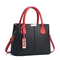Chic black and red color-block handbag with gold hardware and adjustable strap - Black/Red