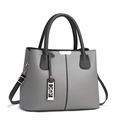 Gray and black contrast handbag with lychee texture leather and silver YEH brand pendant - Gray