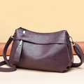 Deep purple leather shoulder bag for women featuring a textured lychee finish and pockets - Purple