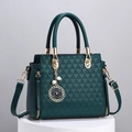 Dark green handbag with 3D triangle texture and elegant four-leaf clover pendant charm - Green
