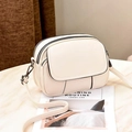 Cream white crossbody camera bag in lychee texture leather with double zip and front flap - Off-white